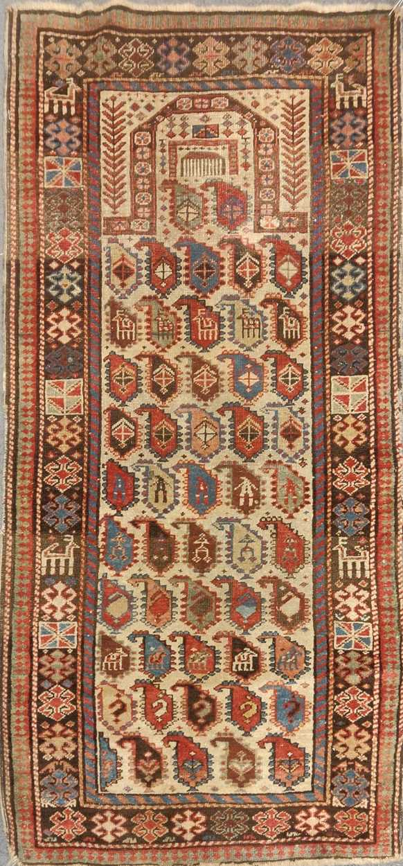 A late 19th century Akstafa prayer rug with boteh field, 173 x 85cmRug faded to various