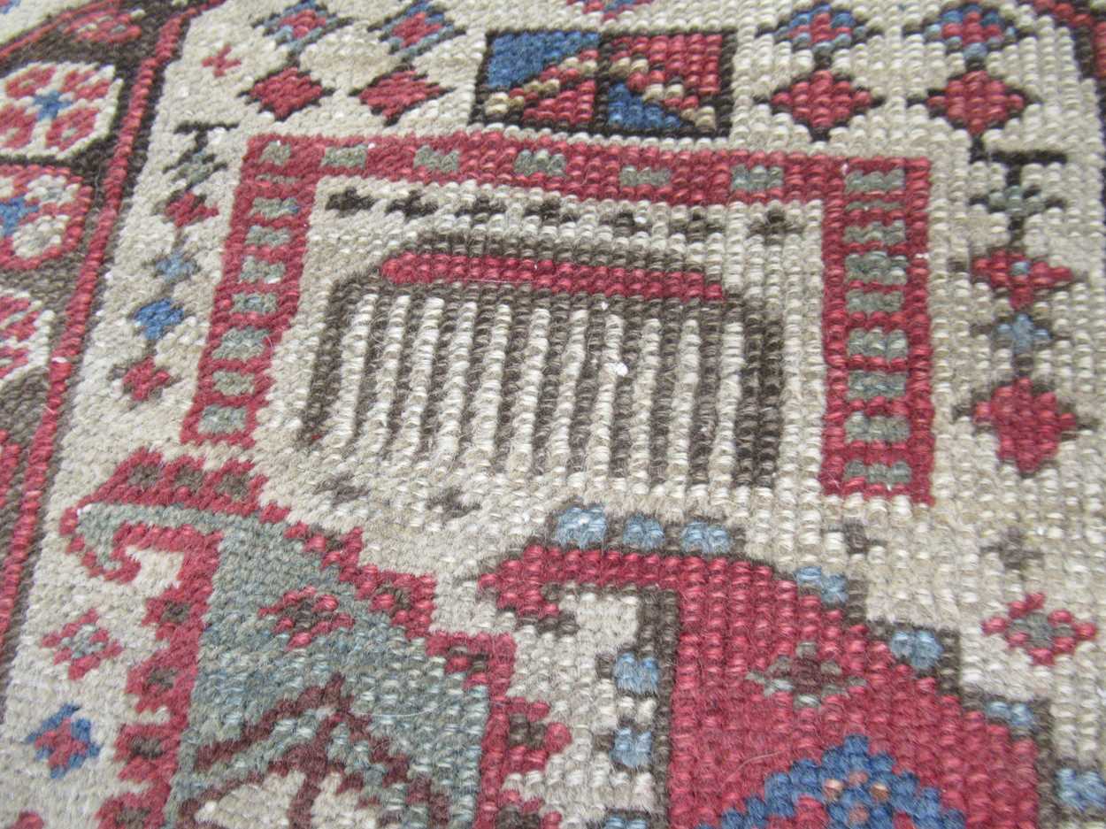 A late 19th century Akstafa prayer rug with boteh field, 173 x 85cmRug faded to various - Bild 18 aus 21