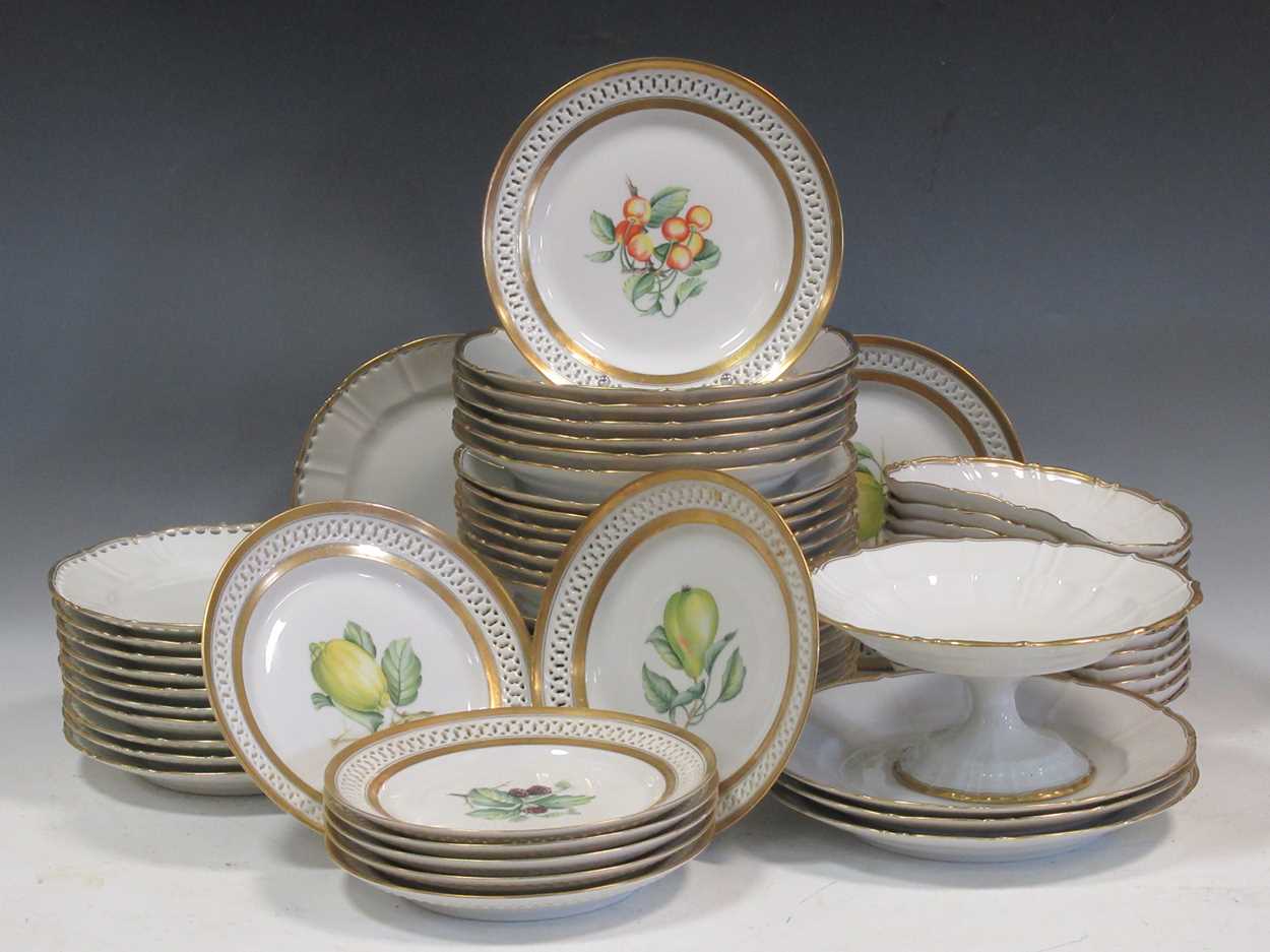 A Copenhagen porcelain botanical desert service, nine plates with pierced borders and a B&G part