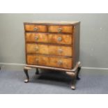 A George III elm and banded chest of drawers on cabriole legs, 109 x 93 x 47cm