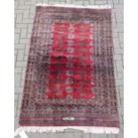 zzz A Bokhara rug. signed, 210 x 122cm