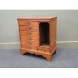 An Edwardian mahogany small chest, of seven drawers about a recess, 71 x 64 x 33cm