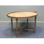 A mahogany oval tray top occasional table, 50 x 57 x 78cm, together with a George III birdcage