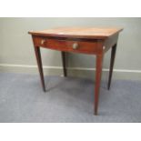 A 19th century bow fronted mahogany table with a single drawer, 72 77 x 52cm