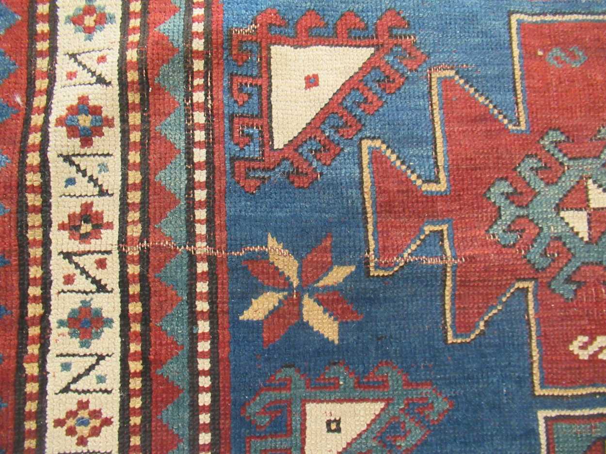 A late 19th century Kazakh rug, 172 x 104cm Fraying to the edges, signs of repair,, noticably the - Bild 9 aus 9