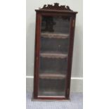 A Georgian style mahogany hanging display cabinet with shaped cresting panel, reeded sides and a