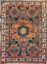 An Afsher rug with bold central medallion, 168 x 123cmVery worn, pile thinned, especially to the