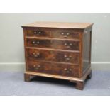 An 18th century and later walnut and oak chest of two short over three long drawers raised on