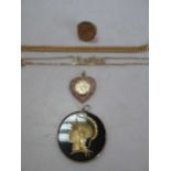 A hallmarked 9ct gold ring mounted with a half sovereign dated 1914, a hallmarked 9ct gold necklace,