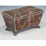 A simulated tortoiseshell and ivory tea caddy, 10 x 18 x 11cm