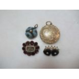 A quartet of memorial jewels, with the pendant and garnet panel brooch testing as 9ct gold (4)