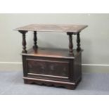 A 19th century oak monks bench, the table top detached from the base, 82 x 90 x 53cm