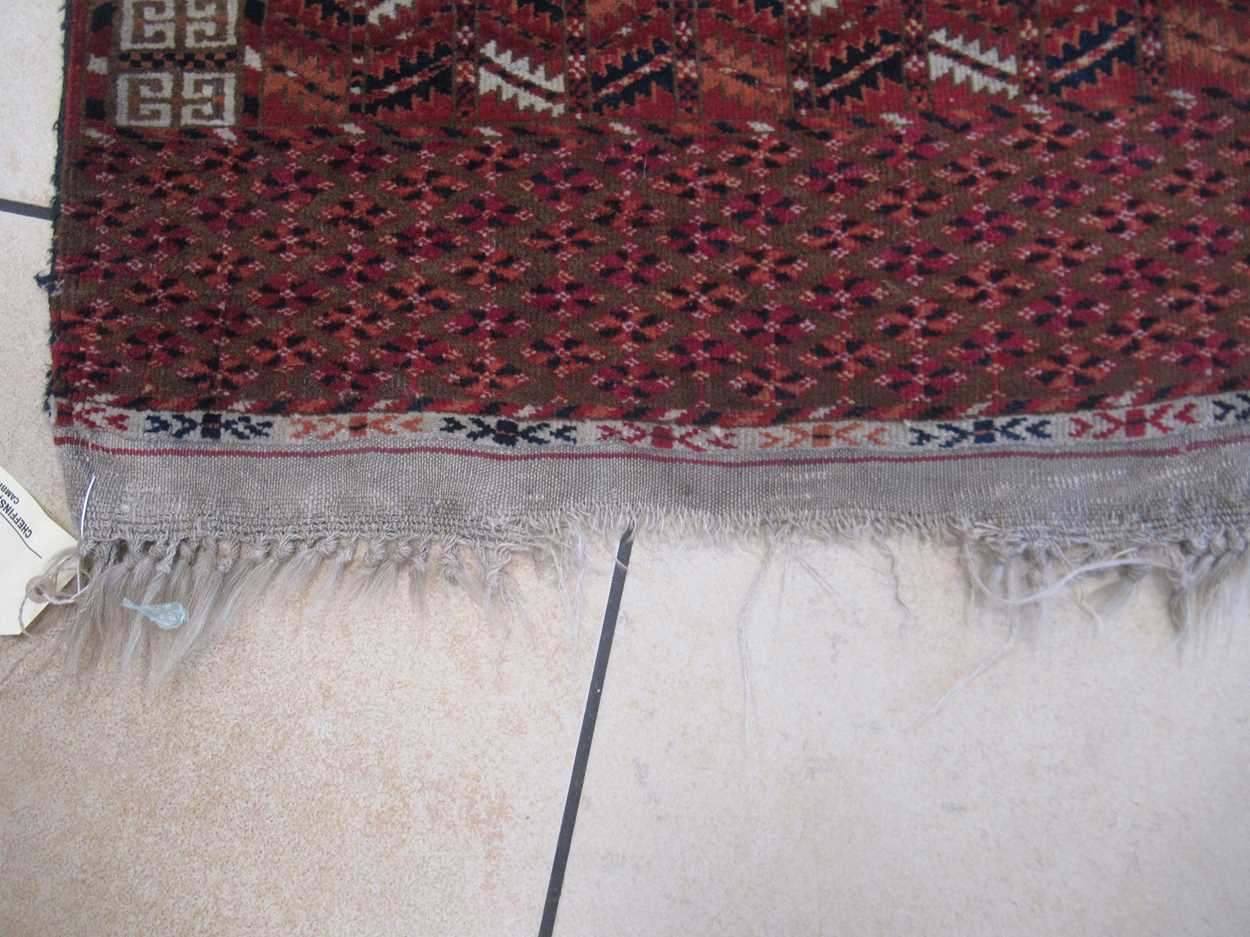 Early 20th century Tekke Ensi 155 x 121cmGeneral wear and fraying to the edges and tassels Holes - Bild 11 aus 13