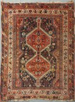 A Qashqai double pole medallion rug 193 x 158cmFraying to fringes and edges Colour is generally good
