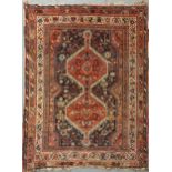 A Qashqai double pole medallion rug 193 x 158cmFraying to fringes and edges Colour is generally good