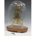 A Victorian gilt brass skeleton clock, striking on one bell, with pierced silvered dial with black