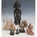 Group of antiquities and later objects, including Arhike, terracotta head of a Goddess, possibly