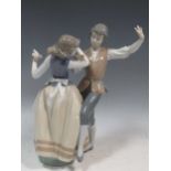 A large Lladro model of the two dancers, 30cm highMinor markings to the exterior commensurate with