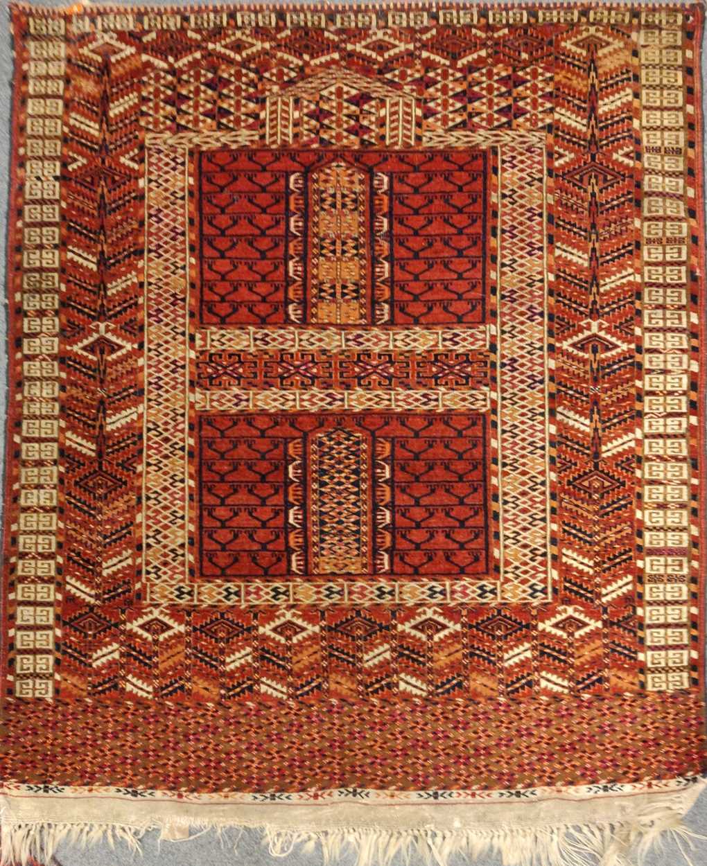 Early 20th century Tekke Ensi 155 x 121cmGeneral wear and fraying to the edges and tassels Holes