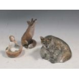 Three Royal Copenhagen figures, to include a seated fox '1475' 14.5cm high, a fox and her cubs '