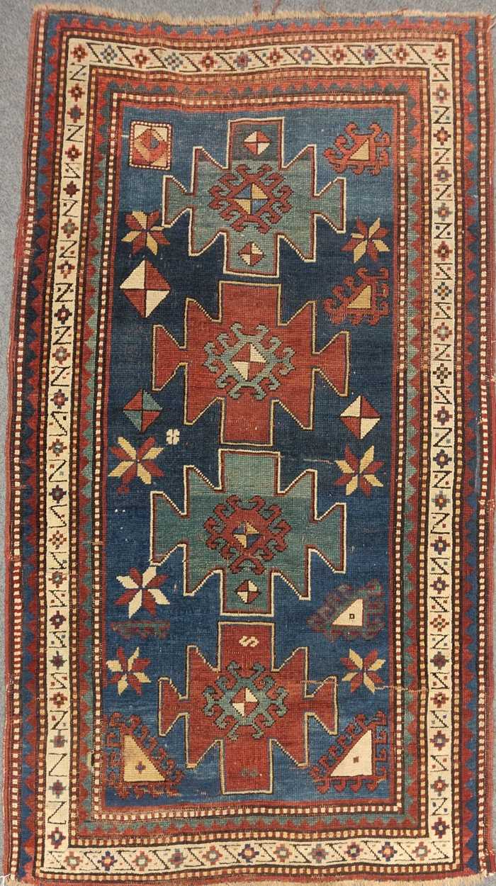 A late 19th century Kazakh rug, 172 x 104cm Fraying to the edges, signs of repair,, noticably the