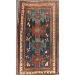 A late 19th century Kazakh rug, 172 x 104cm Fraying to the edges, signs of repair,, noticably the