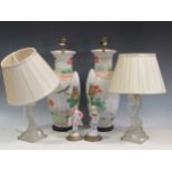 A pair of Chinese ceramic lamps decorated with birds together with four figural lamps (6)