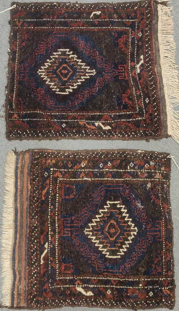 An unusual Turkmen bagface and a pair of bagfaces, 90 x 64cm, 63 x 56cm, 60 x 55cm - Bild 2 aus 2