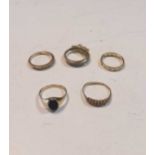 Two half hoop style rings, a full eternity set with synthetic spinels, a signet ring, and dress