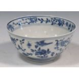 A Chinese blue and white bowl, 19th century, painted with birds and flowers, 15cm diameterMarkings