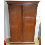 A late 19th century mahogany two door wardrobe, 222 cm x 147 cm x 70 cm