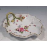 A late 19th century Meissen leaf shaped dish decorated with various flowers, 22cm wide