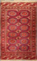 An early 20th century Tekke Turkman rug in a bold cochineal colour 180 x 114cm