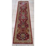 A Turkish style runner, 308 x 82cm