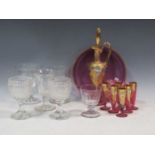 A Bohemian gilt overlaid cranberry glass liqueur set; together with various 19th century glass