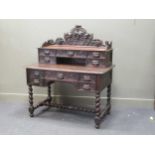 A late Victorian carved oak desk 130 x 114 x 62cm