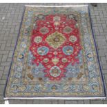 zzz A modern Persian style rug decorated with mythical creatures and another with blue ground (2)
