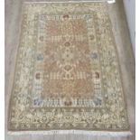 A Persian yellow ground rug, 216 x 140cm