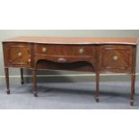 A 19th century mahogany serpentine sideboard, stamped 5362 to the back, locks stamped WARING &