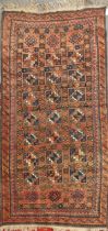 An Afghan rug 222 x 125cm