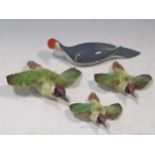 A set of three Beswick flying Woodpeckers together with a Royal Dux WoodpeckerThe Royal Dux