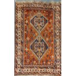 An early 20th century Qashqai carpet with a two-medallion field, 200 x 158cmColour generally is