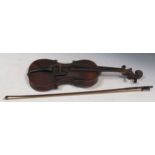 A violin, circa 1900 old varnish now crackled and dirty 60cm long and a bow