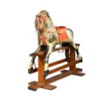 A wooden painted rocking horse, circa 1900, refurbished by Stevenson Brothers,