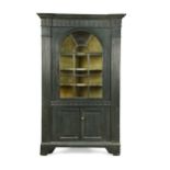 A large green painted corner cabinet, 18th century,