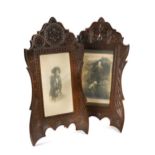 A pair of chip carved hardwood easel-backed photograph frames, early 20th century,