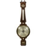 An imposing Regency mahogany and brass strung wheel barometer,