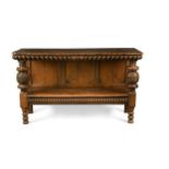 An Elizabethan and later carved oak two-tier buffet,