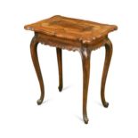 A Continental walnut and fruitwood side table, 19th century,