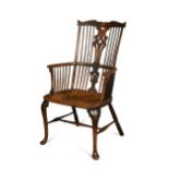 A Thames Valley cherry, walnut and elm comb-back armchair, circa 1775,